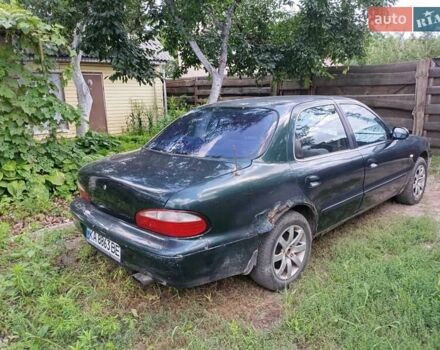 Зеленый Киа Кларус, объемом двигателя 2 л и пробегом 323 тыс. км за 1000 $, фото 3 на Automoto.ua