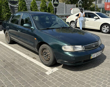 Зеленый Киа Кларус, объемом двигателя 2 л и пробегом 350 тыс. км за 1999 $, фото 7 на Automoto.ua