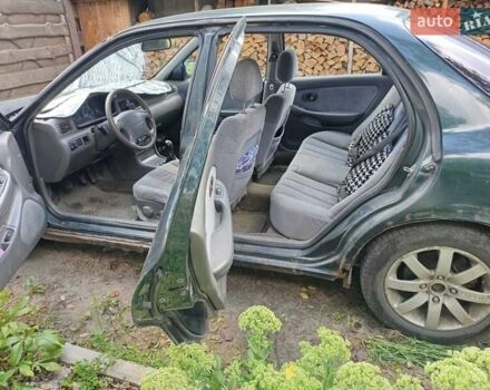 Зеленый Киа Кларус, объемом двигателя 2 л и пробегом 323 тыс. км за 1000 $, фото 8 на Automoto.ua