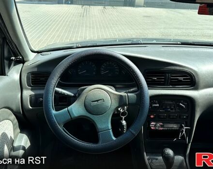 Зеленый Киа Кларус, объемом двигателя 2 л и пробегом 356 тыс. км за 1599 $, фото 8 на Automoto.ua