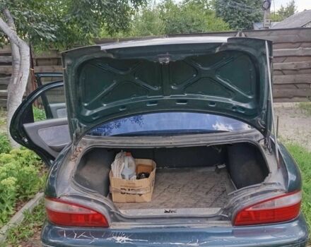 Зелений Кіа Кларус, об'ємом двигуна 2 л та пробігом 323 тис. км за 1000 $, фото 10 на Automoto.ua