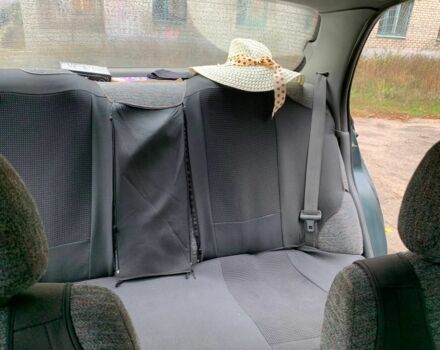 Зеленый Киа Кларус, объемом двигателя 2 л и пробегом 300 тыс. км за 1668 $, фото 2 на Automoto.ua