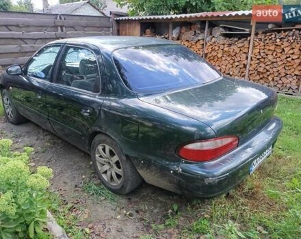 Зеленый Киа Кларус, объемом двигателя 2 л и пробегом 323 тыс. км за 1000 $, фото 4 на Automoto.ua