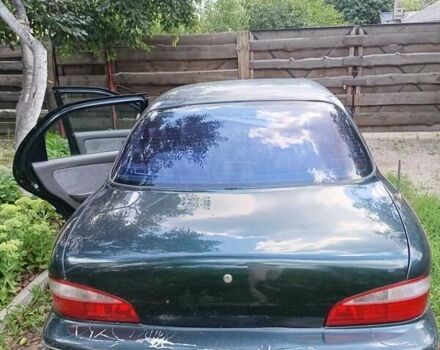 Зеленый Киа Кларус, объемом двигателя 2 л и пробегом 323 тыс. км за 1000 $, фото 5 на Automoto.ua