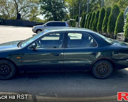 Зеленый Киа Кларус, объемом двигателя 2 л и пробегом 356 тыс. км за 1599 $, фото 2 на Automoto.ua