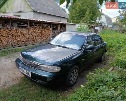 Зеленый Киа Кларус, объемом двигателя 2 л и пробегом 323 тыс. км за 1000 $, фото 15 на Automoto.ua