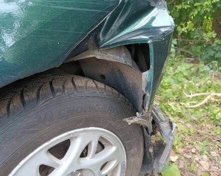Зелений Кіа Кларус, об'ємом двигуна 2 л та пробігом 407 тис. км за 600 $, фото 4 на Automoto.ua