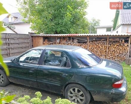 Зеленый Киа Кларус, объемом двигателя 2 л и пробегом 323 тыс. км за 1000 $, фото 1 на Automoto.ua