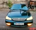 Зеленый Киа Кларус, объемом двигателя 2 л и пробегом 313 тыс. км за 1500 $, фото 1 на Automoto.ua