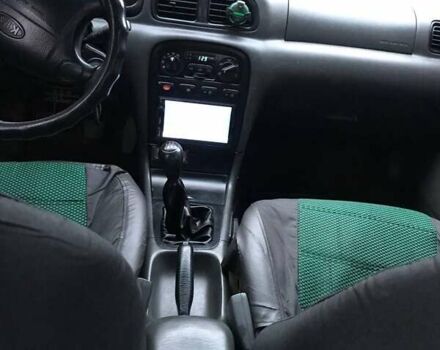 Зеленый Киа Кларус, объемом двигателя 2 л и пробегом 360 тыс. км за 2100 $, фото 4 на Automoto.ua