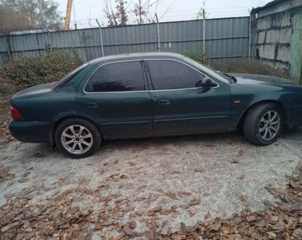 Зеленый Киа Кларус, объемом двигателя 2 л и пробегом 310 тыс. км за 1400 $, фото 10 на Automoto.ua