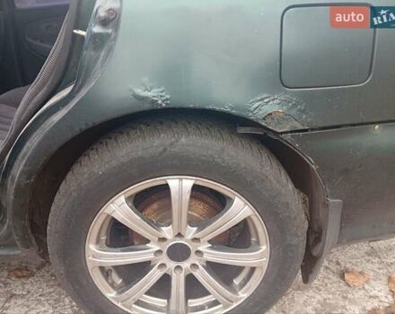 Зелений Кіа Кларус, об'ємом двигуна 2 л та пробігом 320 тис. км за 1250 $, фото 4 на Automoto.ua