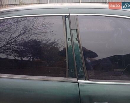 Зелений Кіа Кларус, об'ємом двигуна 2 л та пробігом 320 тис. км за 1250 $, фото 2 на Automoto.ua