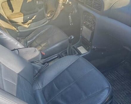 Зеленый Киа Кларус, объемом двигателя 2 л и пробегом 258 тыс. км за 2000 $, фото 4 на Automoto.ua