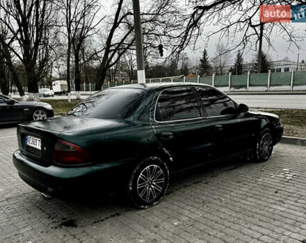 Зеленый Киа Кларус, объемом двигателя 1.79 л и пробегом 304 тыс. км за 1500 $, фото 5 на Automoto.ua