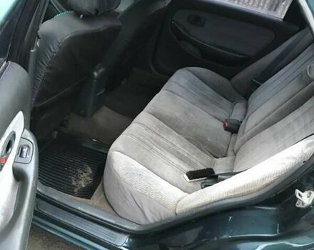 Зеленый Киа Кларус, объемом двигателя 2 л и пробегом 360 тыс. км за 2100 $, фото 3 на Automoto.ua