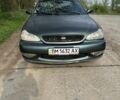 Зелений Кіа Кларус, об'ємом двигуна 2 л та пробігом 290 тис. км за 2000 $, фото 1 на Automoto.ua
