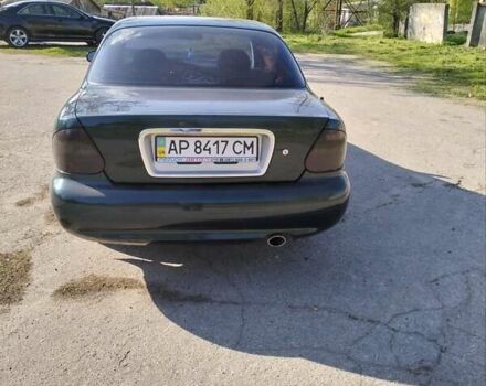 Зелений Кіа Кларус, об'ємом двигуна 2 л та пробігом 130 тис. км за 3800 $, фото 2 на Automoto.ua