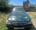 Зеленый Киа Кларус, объемом двигателя 2 л и пробегом 200 тыс. км за 650 $, фото 1 на Automoto.ua