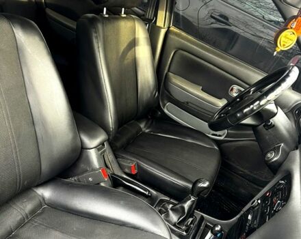 Зелений Кіа Кларус, об'ємом двигуна 1.8 л та пробігом 304 тис. км за 1500 $, фото 7 на Automoto.ua