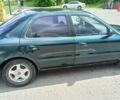 Зеленый Киа Кларус, объемом двигателя 2 л и пробегом 310 тыс. км за 2300 $, фото 3 на Automoto.ua