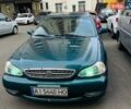 Зеленый Киа Кларус, объемом двигателя 2 л и пробегом 317 тыс. км за 2000 $, фото 1 на Automoto.ua