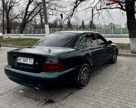 Зеленый Киа Кларус, объемом двигателя 1.79 л и пробегом 304 тыс. км за 1500 $, фото 4 на Automoto.ua