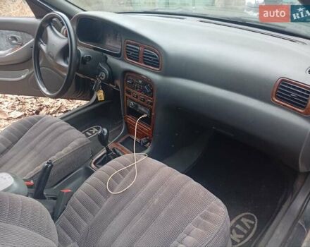 Зелений Кіа Кларус, об'ємом двигуна 2 л та пробігом 320 тис. км за 1250 $, фото 8 на Automoto.ua