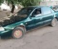 Зеленый Киа Кларус, объемом двигателя 2 л и пробегом 300 тыс. км за 609 $, фото 2 на Automoto.ua