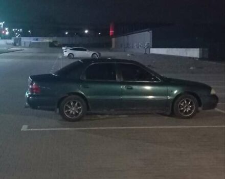 Зеленый Киа Кларус, объемом двигателя 2 л и пробегом 258 тыс. км за 2000 $, фото 1 на Automoto.ua