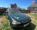 Зеленый Киа Кларус, объемом двигателя 2.02 л и пробегом 200 тыс. км за 650 $, фото 1 на Automoto.ua