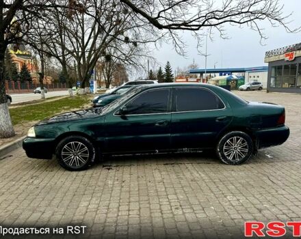 Зелений Кіа Кларус, об'ємом двигуна 1.8 л та пробігом 304 тис. км за 1500 $, фото 2 на Automoto.ua