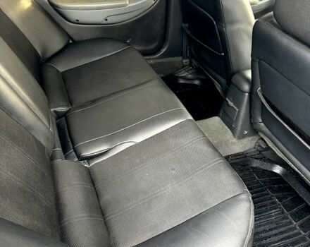 Зелений Кіа Кларус, об'ємом двигуна 1.8 л та пробігом 304 тис. км за 1500 $, фото 8 на Automoto.ua