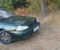 Зеленый Киа Кларус, объемом двигателя 2 л и пробегом 350 тыс. км за 900 $, фото 1 на Automoto.ua