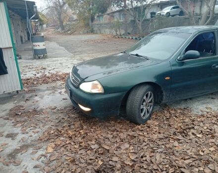 Зеленый Киа Кларус, объемом двигателя 2 л и пробегом 310 тыс. км за 1400 $, фото 1 на Automoto.ua