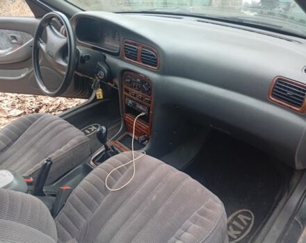 Зеленый Киа Кларус, объемом двигателя 2 л и пробегом 310 тыс. км за 1400 $, фото 3 на Automoto.ua