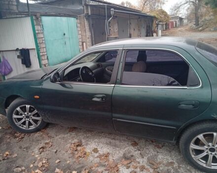 Зеленый Киа Кларус, объемом двигателя 2 л и пробегом 310 тыс. км за 1400 $, фото 11 на Automoto.ua