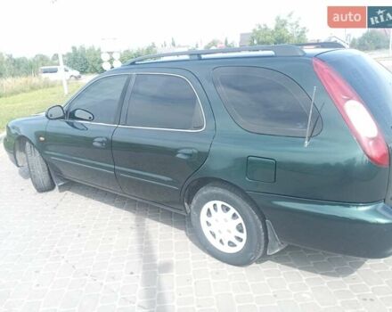 Зеленый Киа Кларус, объемом двигателя 1.8 л и пробегом 170 тыс. км за 1850 $, фото 13 на Automoto.ua