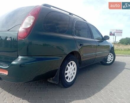 Зеленый Киа Кларус, объемом двигателя 1.8 л и пробегом 170 тыс. км за 1850 $, фото 11 на Automoto.ua