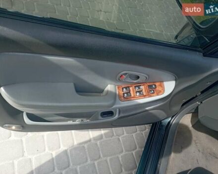 Зеленый Киа Кларус, объемом двигателя 1.8 л и пробегом 170 тыс. км за 1850 $, фото 10 на Automoto.ua