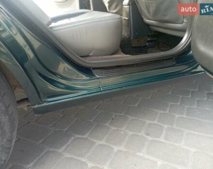 Зеленый Киа Кларус, объемом двигателя 1.8 л и пробегом 170 тыс. км за 1850 $, фото 5 на Automoto.ua