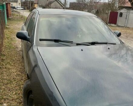 Зелений Кіа Кларус, об'ємом двигуна 2 л та пробігом 360 тис. км за 1100 $, фото 1 на Automoto.ua