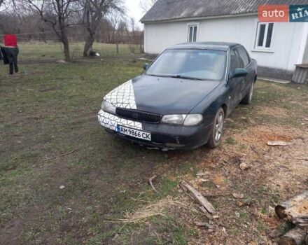 Зеленый Киа Кларус, объемом двигателя 1.79 л и пробегом 320 тыс. км за 1400 $, фото 1 на Automoto.ua