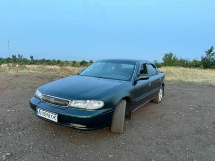 Зеленый Киа Кларус, объемом двигателя 2 л и пробегом 300 тыс. км за 1668 $, фото 1 на Automoto.ua