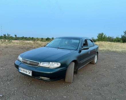 Зеленый Киа Кларус, объемом двигателя 2 л и пробегом 300 тыс. км за 1668 $, фото 1 на Automoto.ua