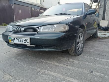 Зеленый Киа Кларус, объемом двигателя 1.8 л и пробегом 320 тыс. км за 1350 $, фото 1 на Automoto.ua