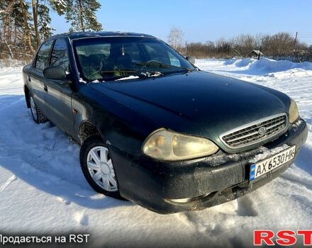 Зелений Кіа Кларус, об'ємом двигуна 1.8 л та пробігом 200 тис. км за 1200 $, фото 1 на Automoto.ua