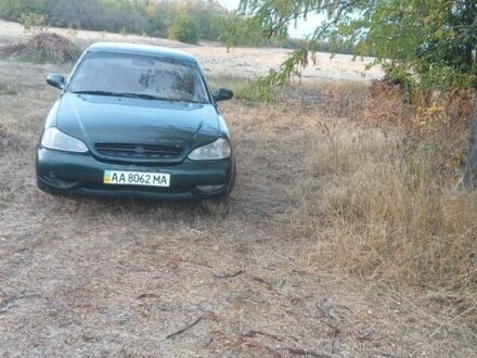 Зеленый Киа Кларус, объемом двигателя 2 л и пробегом 350 тыс. км за 900 $, фото 1 на Automoto.ua