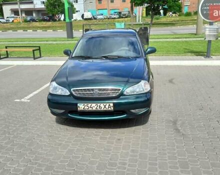 Зелений Кіа Кларус, об'ємом двигуна 2 л та пробігом 310 тис. км за 2300 $, фото 1 на Automoto.ua