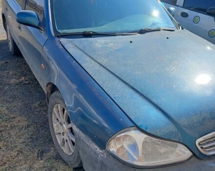 Зелений Кіа Кларус, об'ємом двигуна 2 л та пробігом 300 тис. км за 800 $, фото 1 на Automoto.ua